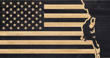 Load image into Gallery viewer, Climber scaling a rock face at edge of American flag