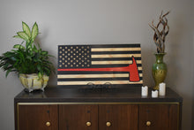 Load image into Gallery viewer, american flag with engraving of red firefighter&#39;s ax, charred wood flag