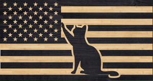 Cat playing with the stars on the American flag