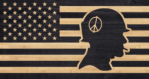 Vietnam soldier silhouette overlaid on American flag 