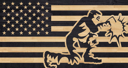 welder repairing american flag stripes over top of American flag